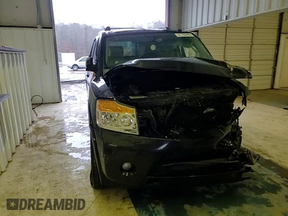 2015 Nissan Armada Platinum z VIN 5N1BA0NFXFN620977, wystawiony jako Copart lot #47793445 z przebiegiem 172 514 mil mil oraz Szkoda całkowita • Salvage title. Historia ofert i sprzedaży dostępna na DreamBid. Obrazek 11.