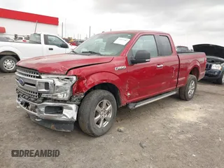 2018 Ford F-150 XL with VIN 1FTFX1E51JKF98962, listed as a IAAI auction lot 41827587 with 128,031 mi miles and . Bid and sale history available at DreamBid. Image 2.