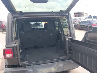 2019 Jeep Wrangler Unlimited Sport S with VIN 1C4HJXDG9KW653488, listed as a IAAI auction lot 42275297 with Not provided miles and . Bid and sale history available at DreamBid. Image 17.