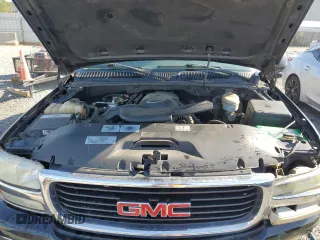 2003 GMC Yukon SLT z VIN 1GKEC13Z43R287134, wystawiony jako Copart lot #53506615 z przebiegiem 199 629 mil mil oraz Szkody całkowita. Historia ofert i sprzedaży dostępna na DreamBid. Obrazek 12.