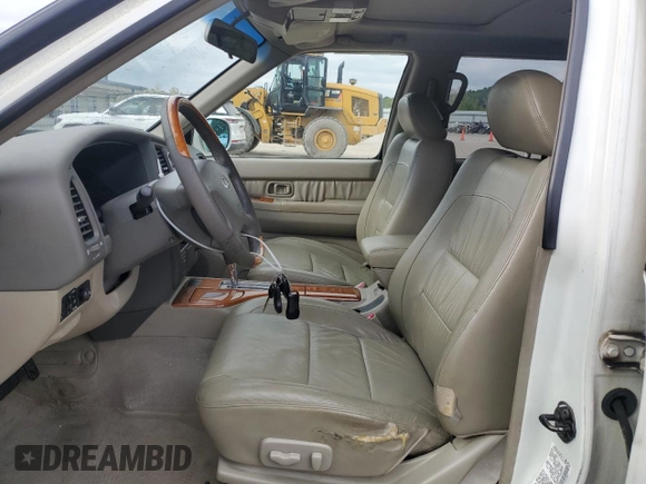 2003 Infiniti QX4 with VIN JNRDR09X83W251941, listed as a Copart auction lot 71044774 with 162,214 mi miles and Salvage Title. Bid and sale history available at DreamBid. Image 7.