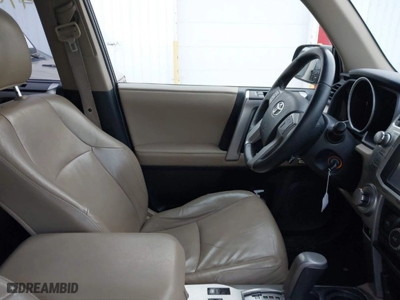2012 Toyota 4Runner SR5 with VIN JTEBU5JR4C5108163, listed as a IAAI auction lot 41072874 with 165,564 mi miles. Bid and sale history available at carsss.com. Image 5.
