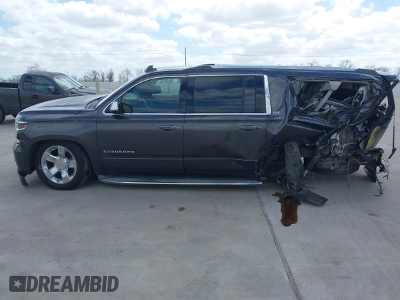 2015 Chevrolet Suburban LTZ with VIN 1GNSCKKC9FR500933, listed as a IAAI auction lot 41830980 with 169,217 mi miles and . Bid and sale history available at DreamBid. Image 13.