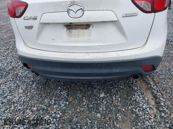 2015 Mazda CX-5 Touring with VIN JM3KE2CY4F0436664, listed as a IAAI auction lot 41876238 with 374,305 mi miles. Bid and sale history available at carsss.com. Image 20.