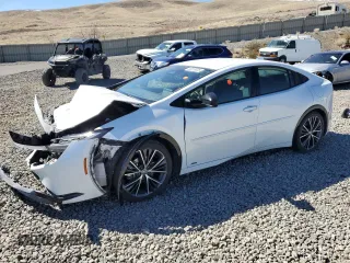 2023 Toyota Prius LE z VIN JTDADABU1P3000421, wystawiony jako Copart lot #50255825 z przebiegiem Nie podano mil oraz Szkoda całkowita • Salvage title. Historia ofert i sprzedaży dostępna na DreamBid. Obrazek 1.