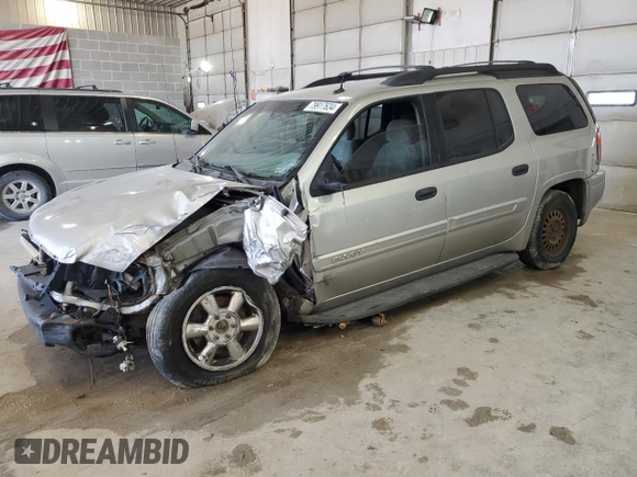 2004 GMC Envoy XL SLE with VIN 1GKET16S146120697, listed as a Copart auction lot 79917634 with 0 mi miles and Salvage Title. Bid and sale history available at carsss.com. Image 1.