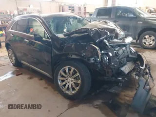 2020 Cadillac XT4 AWD Premium Luxury with VIN 1GYFZDR48LF121111, listed as a IAAI auction lot 41533664 with 1 mi miles. Bid and sale history available at carsss.com. Image 1.
