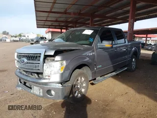 2014 Ford F-150 XL with VIN 1FTFW1CT8EKF75687, listed as a IAAI auction lot 41798973 with 119,972 mi miles. Bid and sale history available at carsss.com. Image 2.