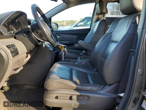 2014 Honda Odyssey EX-L with VIN 5FNRL5H66EB059115, listed as a Copart auction lot 81055334 with 173,410 mi miles and Salvage Title. Bid and sale history available at DreamBid. Image 7.