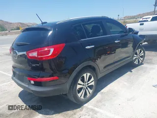 2012 Kia Sportage EX with VIN KNDPC3A25C7245525, listed as a IAAI auction lot 42463238 with 198,938 mi miles and . Bid and sale history available at DreamBid. Image 4.