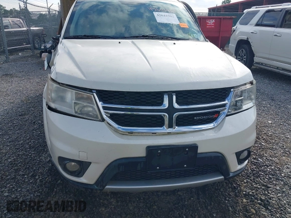 2013 Dodge Journey Crew with VIN 3C4PDDDG9DT685464, listed as a IAAI auction lot 42641982 with 155,901 mi miles and . Bid and sale history available at DreamBid. Image 19.