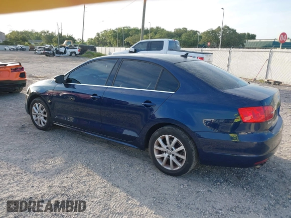 2014 Volkswagen Jetta SE with VIN 3VWD07AJ6EM417996, listed as a IAAI auction lot 42723125 with 108,952 mi miles and . Bid and sale history available at DreamBid. Image 3.