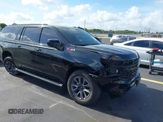 2024 Chevrolet Suburban Z71 z VIN 1GNSKDKD6RR120945, wystawiony jako IAAI lot #42516440 z przebiegiem 13 417 mil mil oraz . Historia ofert i sprzedaży dostępna na DreamBid. Obrazek 1.
