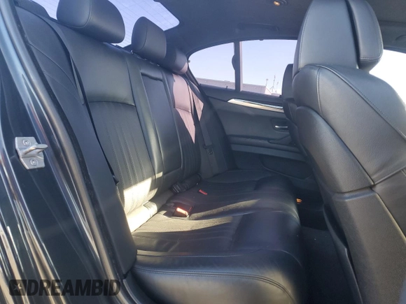 2014 BMW M5 z VIN WBSFV9C55ED593760, wystawiony jako Copart lot #49070765 z przebiegiem 128 365 mil mil oraz Tytuł czysty. Historia ofert i sprzedaży dostępna na DreamBid. Obrazek 10.