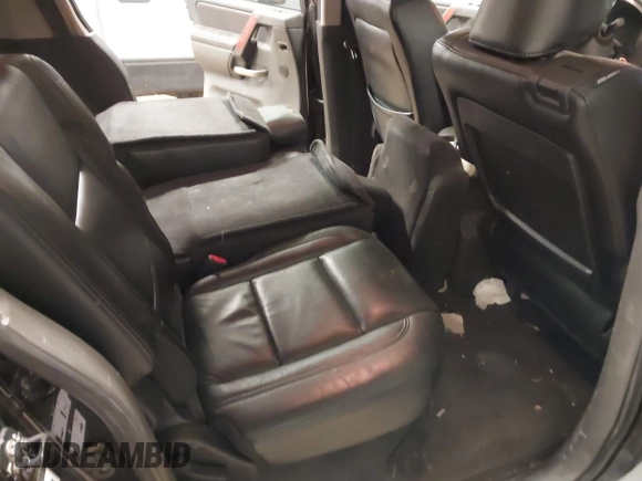 2005 Infiniti QX56 with VIN 5N3AA08CX5N808272, listed as a IAAI auction lot 41790423 with 199,524 mi miles. Bid and sale history available at carsss.com. Image 8.