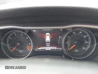 2015 Jeep Cherokee Limited with VIN 1C4PJMDB7FW584076, listed as a IAAI auction lot 41712661 with 183,000 mi miles and . Bid and sale history available at DreamBid. Image 7.