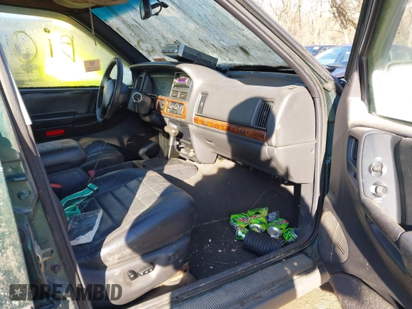 1997 Jeep Grand Cherokee Laredo with VIN 1J4GZ58S2VC605385, listed as a IAAI auction lot 41797715 with 169,996 mi miles and . Bid and sale history available at DreamBid. Image 5.