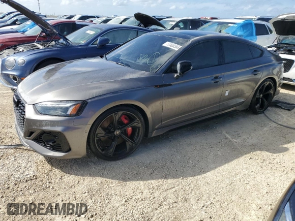 2022 Audi RS 5 Sportback z VIN WUAAWCF57NA901250, wystawiony jako Copart lot #77305584 z przebiegiem Nie podano mil oraz Nie do naprawy. Historia ofert i sprzedaży dostępna na DreamBid. Obrazek 1.