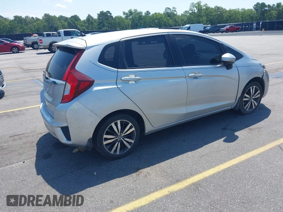 2015 Honda Fit EX-L z VIN 3HGGK5H82FM727678, wystawiony jako IAAI lot #42451860 z przebiegiem 102 512 mil mil oraz . Historia ofert i sprzedaży dostępna na DreamBid. Obrazek 4.