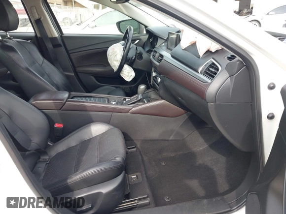 2016 Mazda Mazda6 i Grand Touring with VIN JM1GJ1W51G1444867, listed as a IAAI auction lot 41988597 with 86,844 mi miles. Bid and sale history available at carsss.com. Image 5.