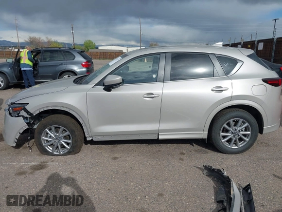 2025 Mazda CX-5 2.5 S Preferred Package with VIN JM3KFBCL1S0601601, listed as a IAAI auction lot 42135173 with 2,392 mi miles. Bid and sale history available at carsss.com. Image 15.