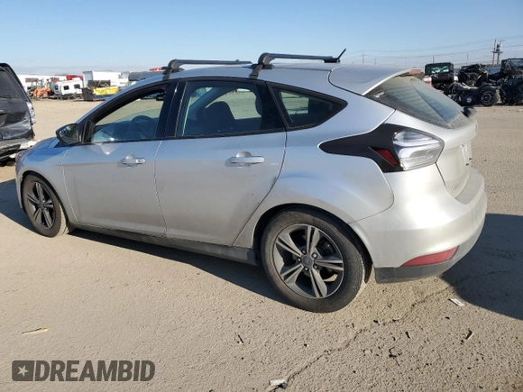 2016 Ford Focus SE with VIN 1FADP3KE4GL208985, listed as a Copart auction lot 88960325 with 111,046 mi miles and Salvage Title. Bid and sale history available at carsss.com. Image 2.