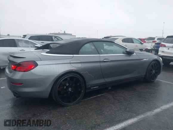 2012 BMW 6 Series 650i with VIN WBALZ3C5XCDL70748, listed as a IAAI auction lot 41502640 with 102,519 mi miles. Bid and sale history available at carsss.com. Image 13.