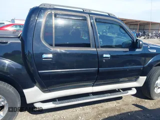 2003 Ford Explorer Sport Trac XLS z VIN 1FMZU77E23UB74361, wystawiony jako IAAI lot #42305659 z przebiegiem 193 291 mil mil oraz . Historia ofert i sprzedaży dostępna na DreamBid. Obrazek 13.
