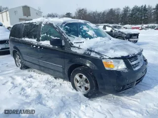 2009 Dodge Grand Caravan SXT with VIN 2D8HN54X29R576959, listed as a IAAI auction lot 41590429 with 113,085 mi miles. Bid and sale history available at carsss.com. Image 1.