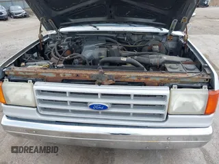 1991 Ford F-150 Special with VIN 2FTEF15Y7MCB07571, listed as a IAAI auction lot 42112922 with 75,013 mi miles. Bid and sale history available at carsss.com. Image 10.