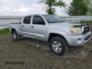 2005 Toyota Tacoma z VIN 5TEMU52N35Z126145, wystawiony jako Copart lot #55391105 z przebiegiem 150 046 mil mil oraz Szkoda całkowita • Salvage title. Historia ofert i sprzedaży dostępna na DreamBid. Obrazek 4.