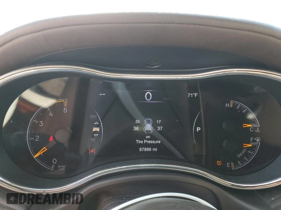 2018 Jeep Grand Cherokee Overland z VIN 1C4RJFCM3JC401399, wystawiony jako Copart lot #53167035 z przebiegiem 87 886 mil mil oraz Nie do naprawy • Non repairable. Historia ofert i sprzedaży dostępna na DreamBid. Obrazek 9.