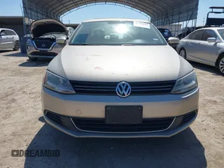 2013 Volkswagen Jetta SE z VIN 3VWDX7AJ4DM236406, wystawiony jako IAAI lot #41785884 z przebiegiem 136 762 mil mil oraz . Historia ofert i sprzedaży dostępna na DreamBid. Obrazek 12.