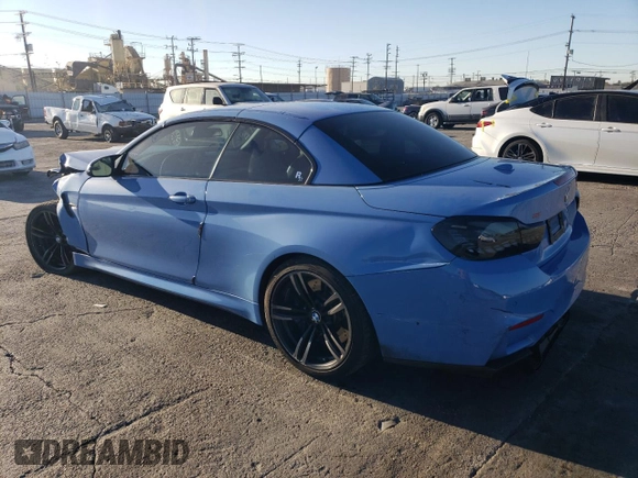 2017 BMW M4 with VIN WBS3U9C57HP970954, listed as a Copart auction lot 84011474 with 56,882 mi miles and Salvage Title. Bid and sale history available at carsss.com. Image 2.