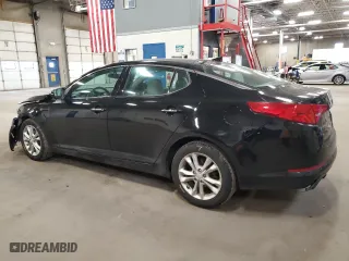 2013 Kia Optima EX with VIN 5XXGN4A72DG131003, listed as a Copart auction lot 51860065 with 197,296 mi miles and Salvage Title. Bid and sale history available at carsss.com. Image 2.