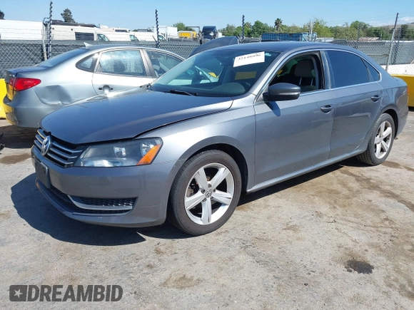 2013 Volkswagen Passat SE w/Sunroof & Nav with VIN 1VWBP7A35DC148149, listed as a IAAI auction lot 42148096 with 228,555 mi miles. Bid and sale history available at carsss.com. Image 2.