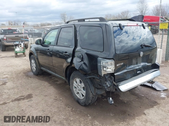 2011 Mercury Mariner with VIN 4M2CN8B7XBKJ01717, listed as a IAAI auction lot 42030587 with 115,766 mi miles and . Bid and sale history available at DreamBid. Image 3.