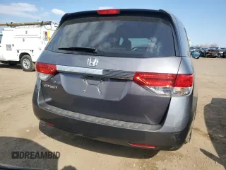 2014 Honda Odyssey EX-L with VIN 5FNRL5H64EB123541, listed as a Copart auction lot 52483705 with 77,996 mi miles and Salvage Title. Bid and sale history available at DreamBid. Image 6.