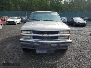 1996 Chevrolet Tahoe with VIN 1GNEK13R5TJ420715, listed as a Copart auction lot 48997145 with 303,588 mi miles and Salvage Title. Bid and sale history available at carsss.com. Image 5.