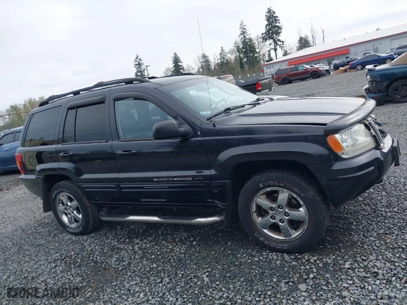 2004 Jeep Grand Cherokee Limited with VIN 1J8GW58N04C186548, listed as a IAAI auction lot 41949015 with 244,505 mi miles. Bid and sale history available at carsss.com. Image 14.