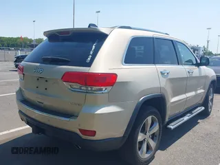2014 Jeep Grand Cherokee Limited with VIN 1C4RJFBG9EC280315, listed as a IAAI auction lot 42400346 with 103,564 mi miles and . Bid and sale history available at DreamBid. Image 4.