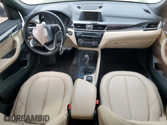 2017 BMW X1 sDrive28i with VIN WBXHU7C30H5H38049, listed as a Copart auction lot 51007915 with 52,963 mi miles and Salvage Title. Bid and sale history available at carsss.com. Image 8.