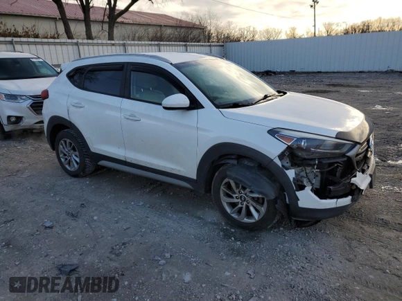2018 Hyundai Tucson SEL with VIN KM8J3CA44JU738050, listed as a Copart auction lot 87405074 with 131,644 mi miles and Salvage title. Bid and sale history available at DreamBid. Image 4.