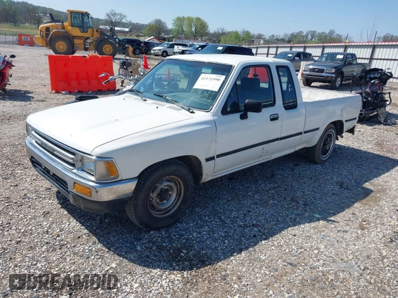 1989 Toyota Pickup z VIN JT4VN93D7K0002714, wystawiony jako IAAI lot #41971990 z przebiegiem 251 337 mil mil oraz . Historia ofert i sprzedaży dostępna na DreamBid. Obrazek 2.
