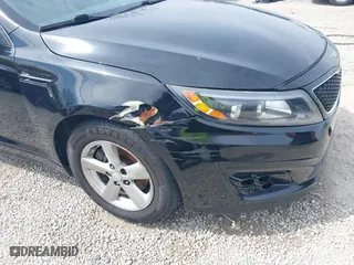 2014 Kia Optima LX with VIN 5XXGM4A72EG343520, listed as a IAAI auction lot 42050562 with 126,270 mi miles. Bid and sale history available at carsss.com. Image 6.