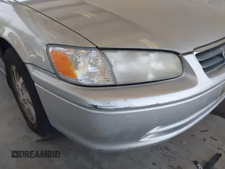 2000 Toyota Camry LE z VIN JT2BF22K2Y0239961, wystawiony jako IAAI lot #42128226 z przebiegiem 154 691 mil mil oraz . Historia ofert i sprzedaży dostępna na DreamBid. Obrazek 6.