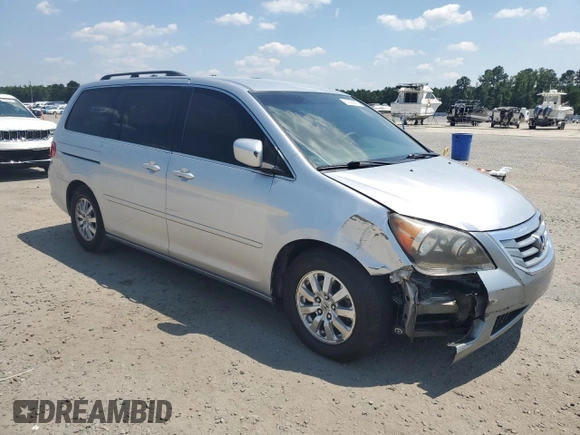 2010 Honda Odyssey EX with VIN 5FNRL3H47AB022393, listed as a Copart auction lot 61956845 with 317,023 mi miles and Salvage title. Bid and sale history available at DreamBid. Image 4.