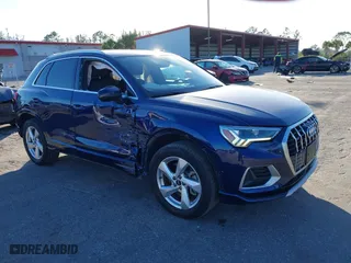 2021 Audi Q3 Premium Plus with VIN WA1BUCF31M1080614, listed as a IAAI auction lot 41283711 with 62,708 mi miles. Bid and sale history available at carsss.com. Image 1.