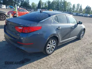 2015 Kia Optima EX with VIN 5XXGN4A77FG368704, listed as a IAAI auction lot 42174674 with 128,963 mi miles. Bid and sale history available at carsss.com. Image 4.