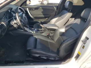 2010 BMW 1 Series 128i with VIN WBAUP9C54AVL89039, listed as a Copart auction lot 50907955 with 135,655 mi miles and Salvage Title. Bid and sale history available at DreamBid. Image 7.